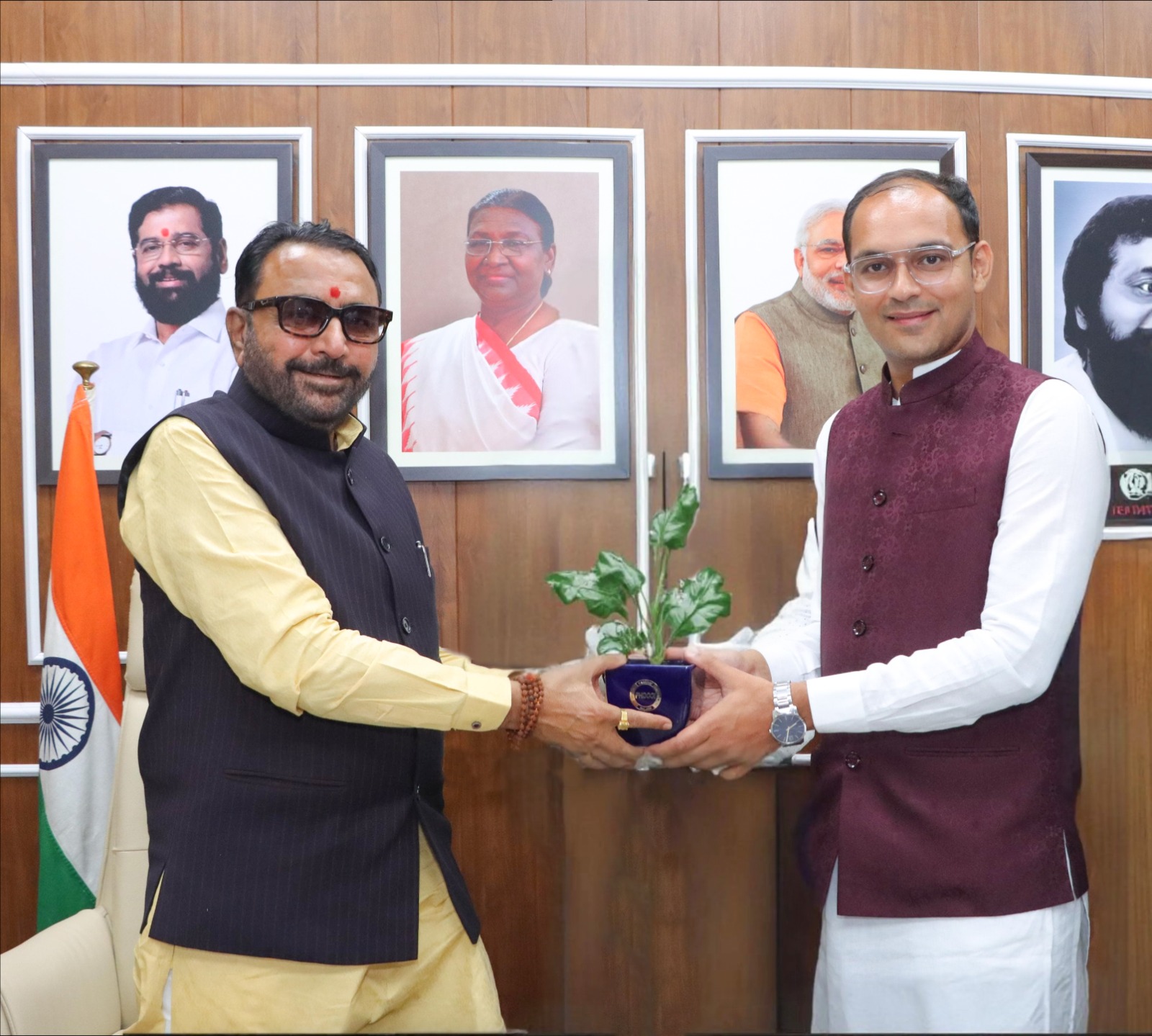 Dr. Puneet Dhawan Founder Karma Ayurveda is being felicitated by Hon’ble AYUSH Minister Shri Prataprao Jadhav