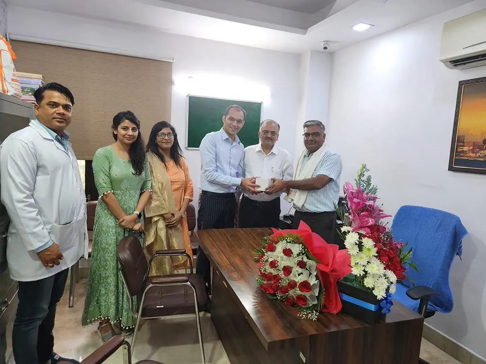 Karma ayurveda's founder: Dr Puneet Dhawan receiving award's from 